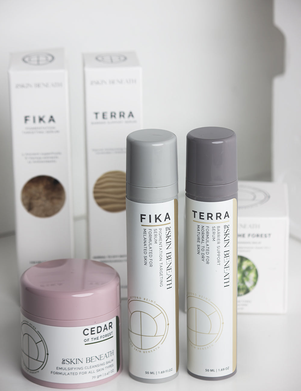 Minimalist image of a cleanser barrier support serum and pigmentation Serum