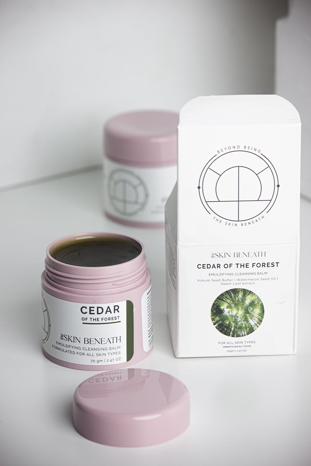 Cedar of the Forest cleansing balm in minimal flatlay, showcasing handcrafted emulsifying balm for dry skin
