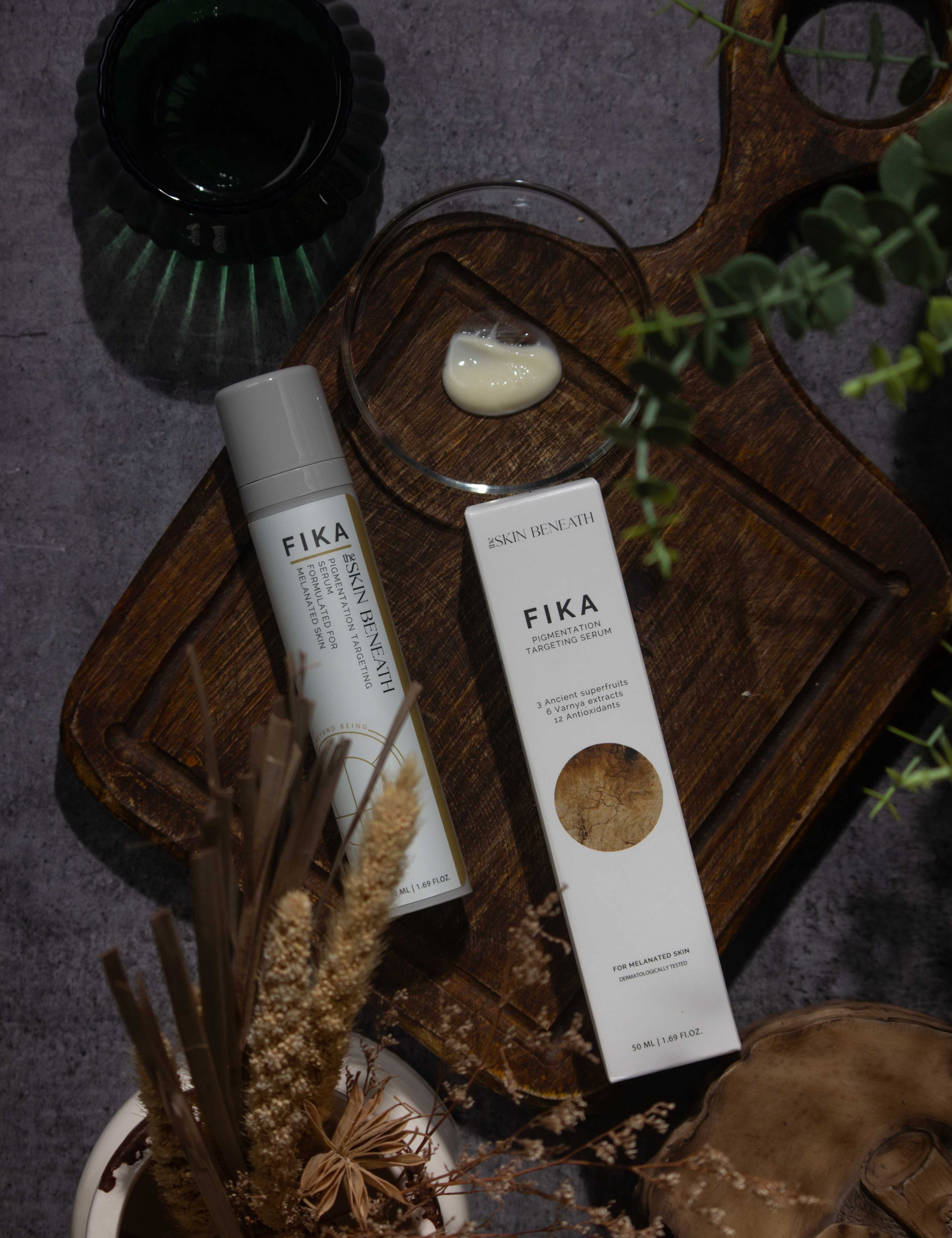 Fika serum placed on vintage wooden board evoking a feel of slow skincare for sensitive skin