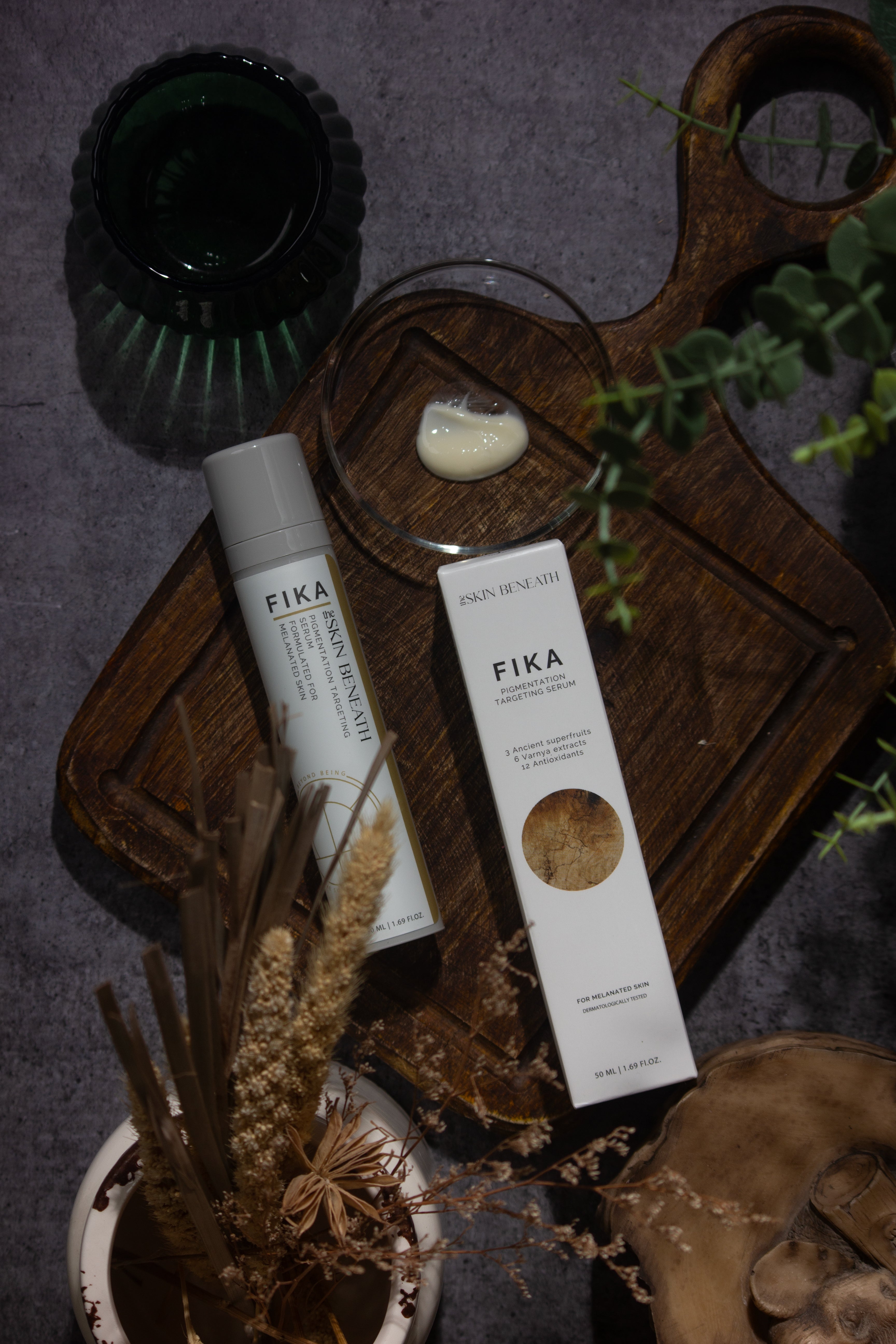 Fika serum placed on vintage wooden board evoking a feel of slow skincare for sensitive skin