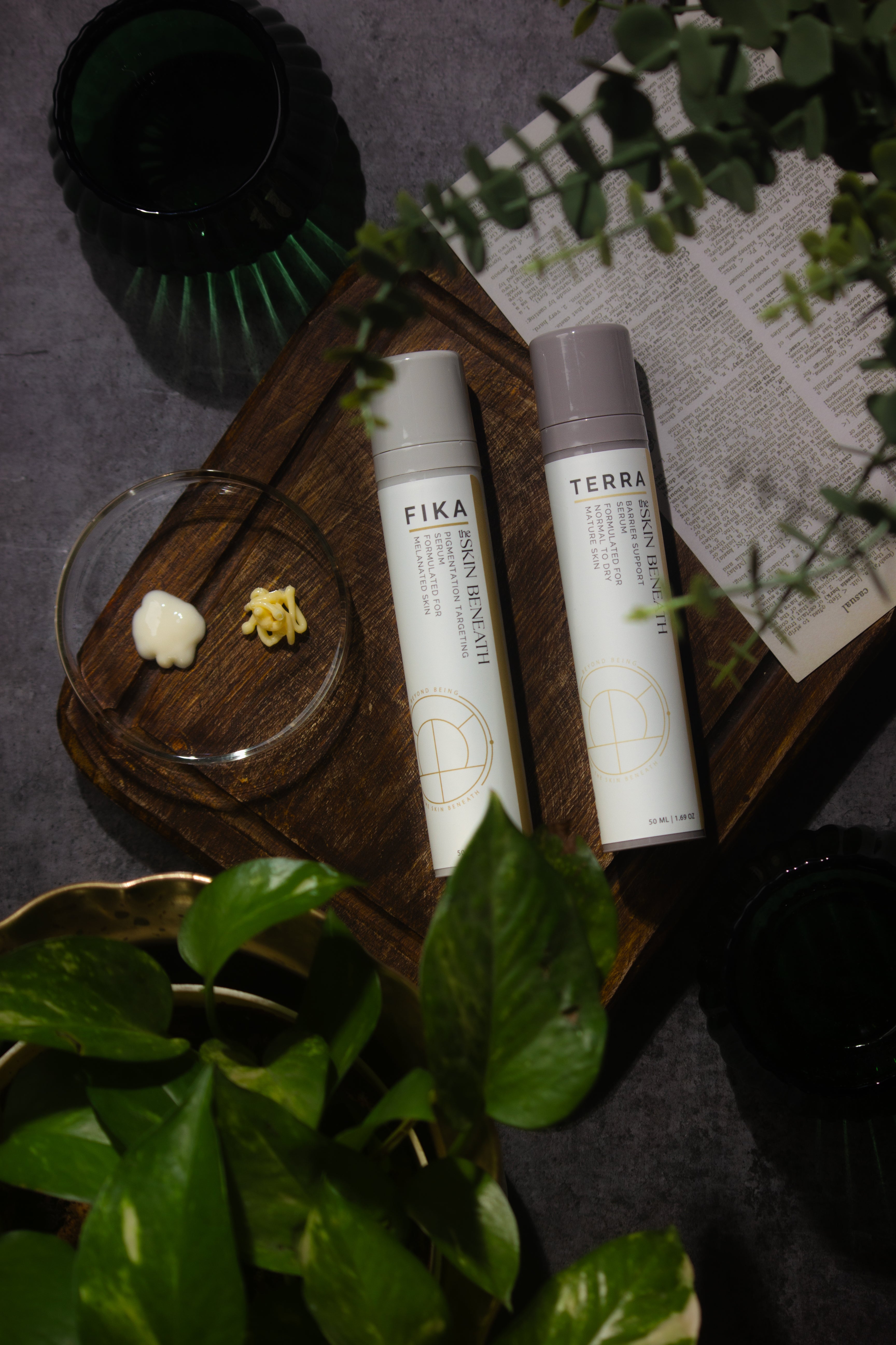 Fika pigmentation serum and Terra barrier-repair serum set on a wooden tray — gentle skincare for melanin-rich, sensitive Indian skin