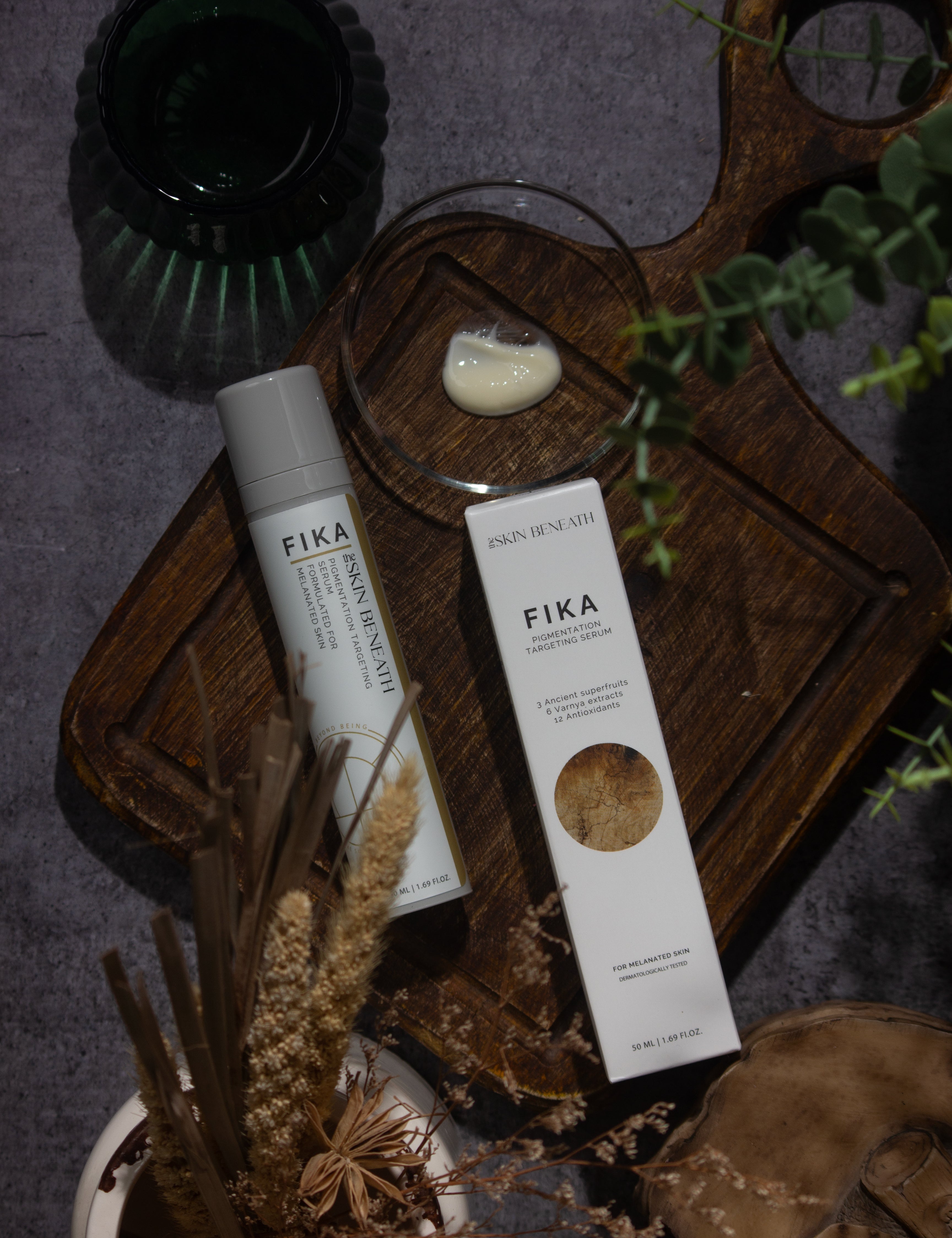 Fika serum placed on vintage wooden board evoking a feel of slow skincare for sensitive skin